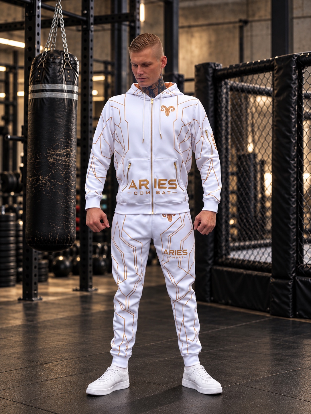 Model wearing the white and gold ARIES COMBAT hoodie and joggers, product visualization
